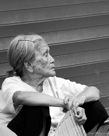 Woman sitting in street